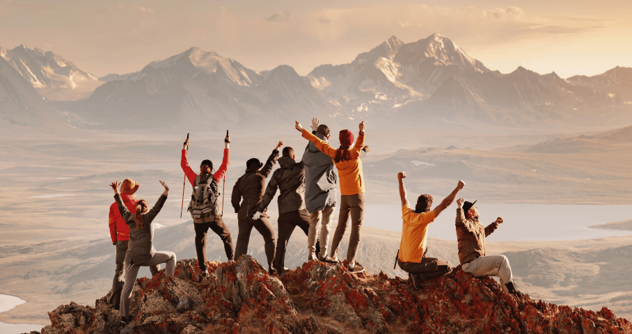 Group of happy people in the mountains