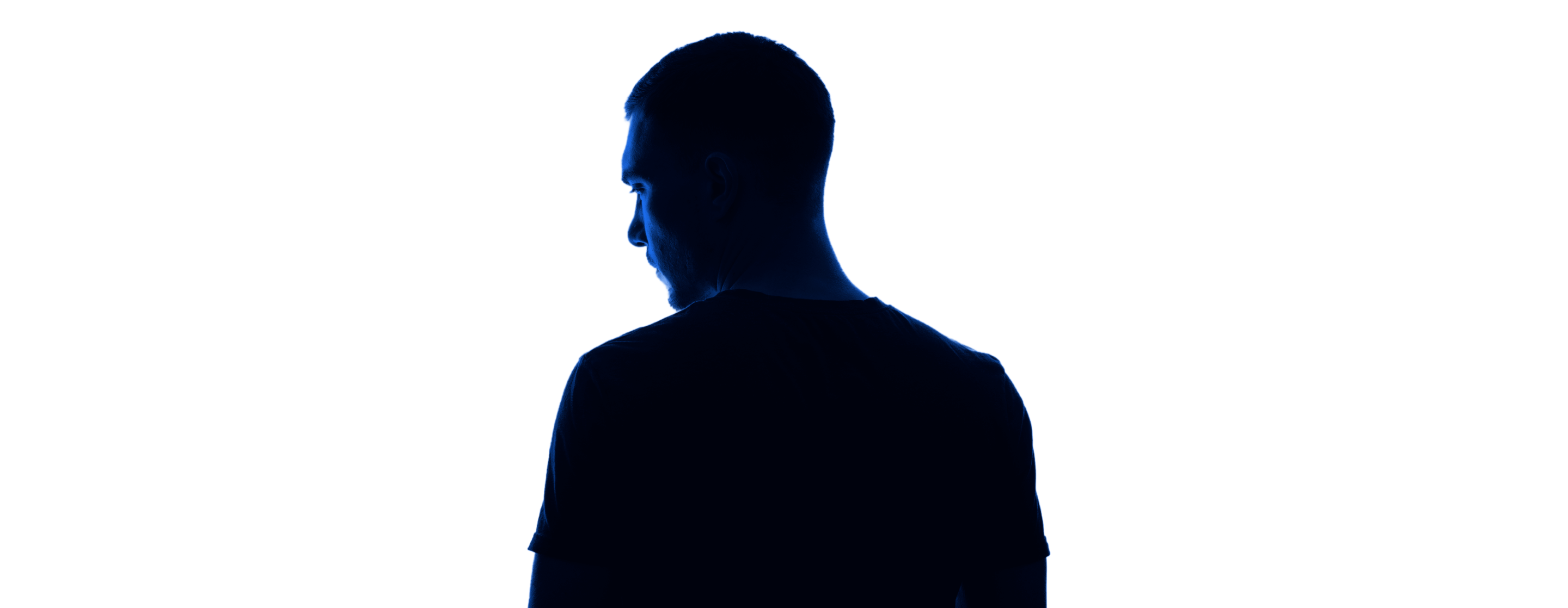 Young man with a blue backlight, no background